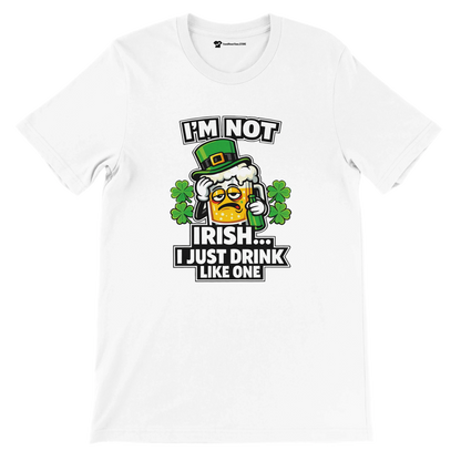 White tee with funny Irish beer graphic, shamrocks, and 'I'm Not Irish... I Just Drink Like One' text for St. Patrick's Day.