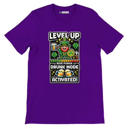Purple tee with pixel art leprechaun, beer, shamrocks, 'Level Up Drunk Mode Activated' text for St. Patrick's Day