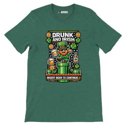 Green tee with 'Drunk and Irish' pixel art leprechaun, beer, shamrocks, and 'Insert Beer to Continue' text.