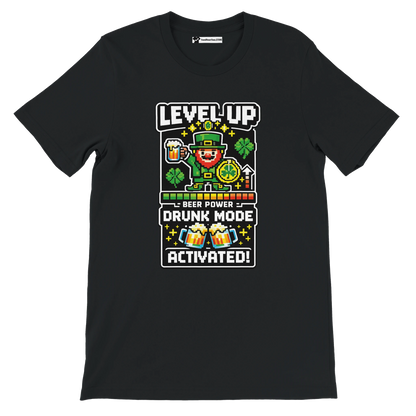 Black tee with pixel art leprechaun, beer, shamrocks, 'Level Up Drunk Mode Activated' text for St. Patrick's Day