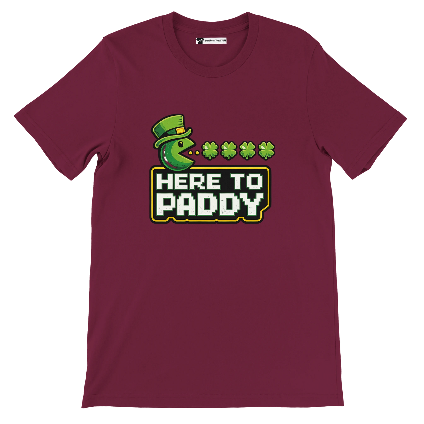Maroon St. Patrick's Day tee with Pac-Man eating shamrocks, 'Here to Paddy' text, leprechaun hat design
