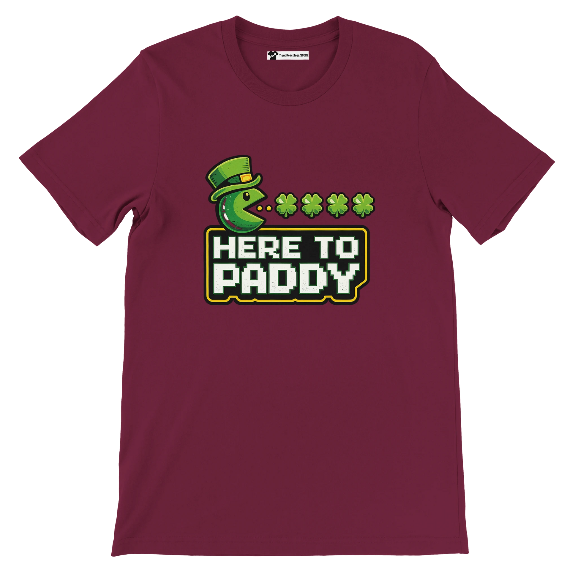 Maroon St. Patrick's Day tee with Pac-Man eating shamrocks, 'Here to Paddy' text, leprechaun hat design
