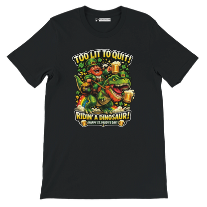 Funny St. Patrick's Day tee: leprechaun riding dinosaur with beer, 'Too Lit to Quit' slogan, rainbow, shamrocks