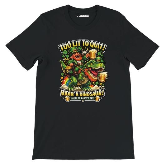 Funny St. Patrick's Day tee: leprechaun riding dinosaur with beer, 'Too Lit to Quit' slogan, rainbow, shamrocks