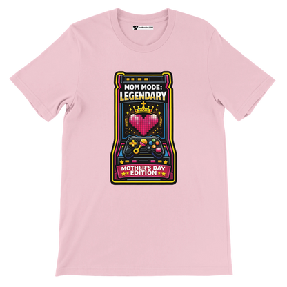 Pink t-shirt with pixelated heart, crown, game controllers, and 'Mom Mode: Legendary Mother's Day Edition' graphic.