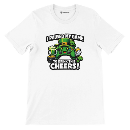 White t-shirt with St. Patrick’s Day gamer design, featuring a green controller, clovers, and beer mug.