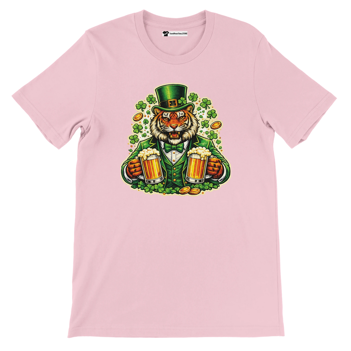 Pink t-shirt with a cartoon tiger in a green St. Patrick's Day outfit holding beer mugs, surrounded by shamrocks and gold coins.