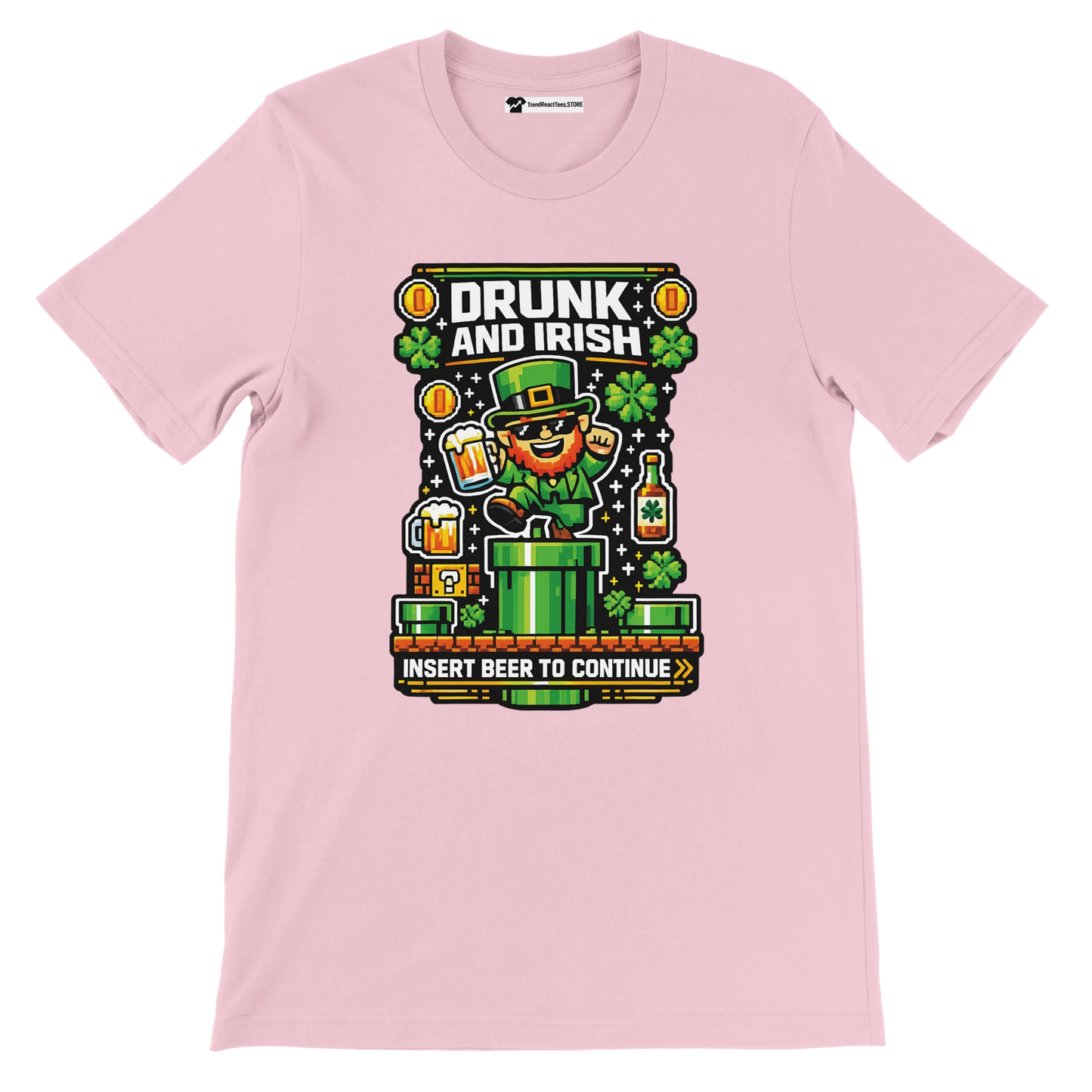 Pink 'Drunk and Irish' pixel art tee with leprechaun, beer, shamrocks, and 'Insert Beer to Continue' gaming text for St. Patrick's Day.