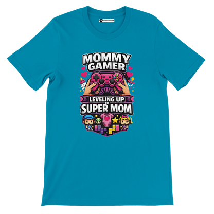 Blue tee with 'Mommy Gamer Leveling Up to Super Mom' design, gaming controller, pixel art