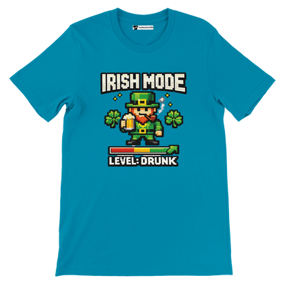 Pixel art Irish leprechaun with beer, shamrocks, 'Irish Mode Level: Drunk' text on teal tee