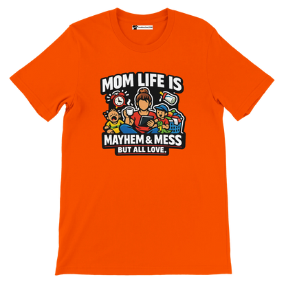 Bright orange t-shirt with cartoon mom and kids, text reads 'Mom life is mayhem & mess but all love'.