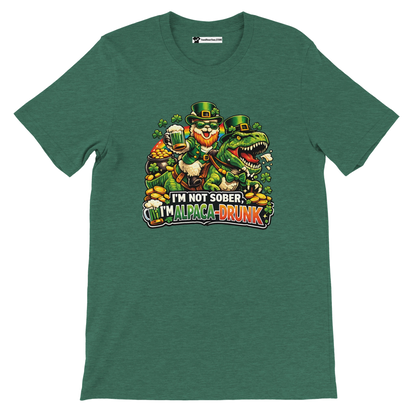 Green St. Patrick's Day tee with leprechaun alpaca riding dinosaur, holding beer, text 'I'm not sober, I'm alpaca-drunk'