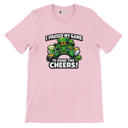 Pink t-shirt with gaming controller, leprechaun hat, shamrocks, and St. Patrick's Day quote.