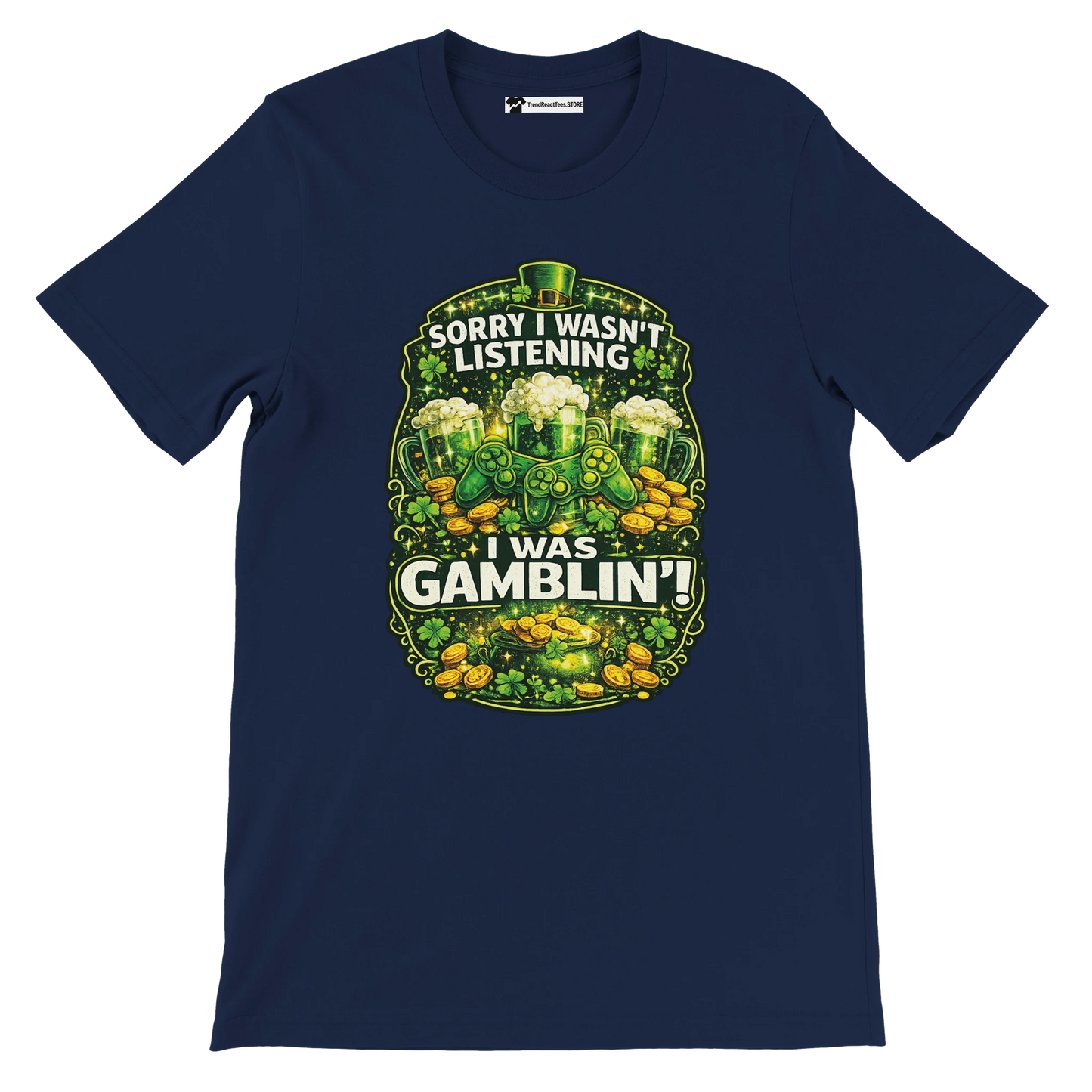 Navy t-shirt with 'Sorry I wasn't listening I was gamblin' text, shamrocks, coins, game controller, and green beer mugs, St. Patrick's Day theme.