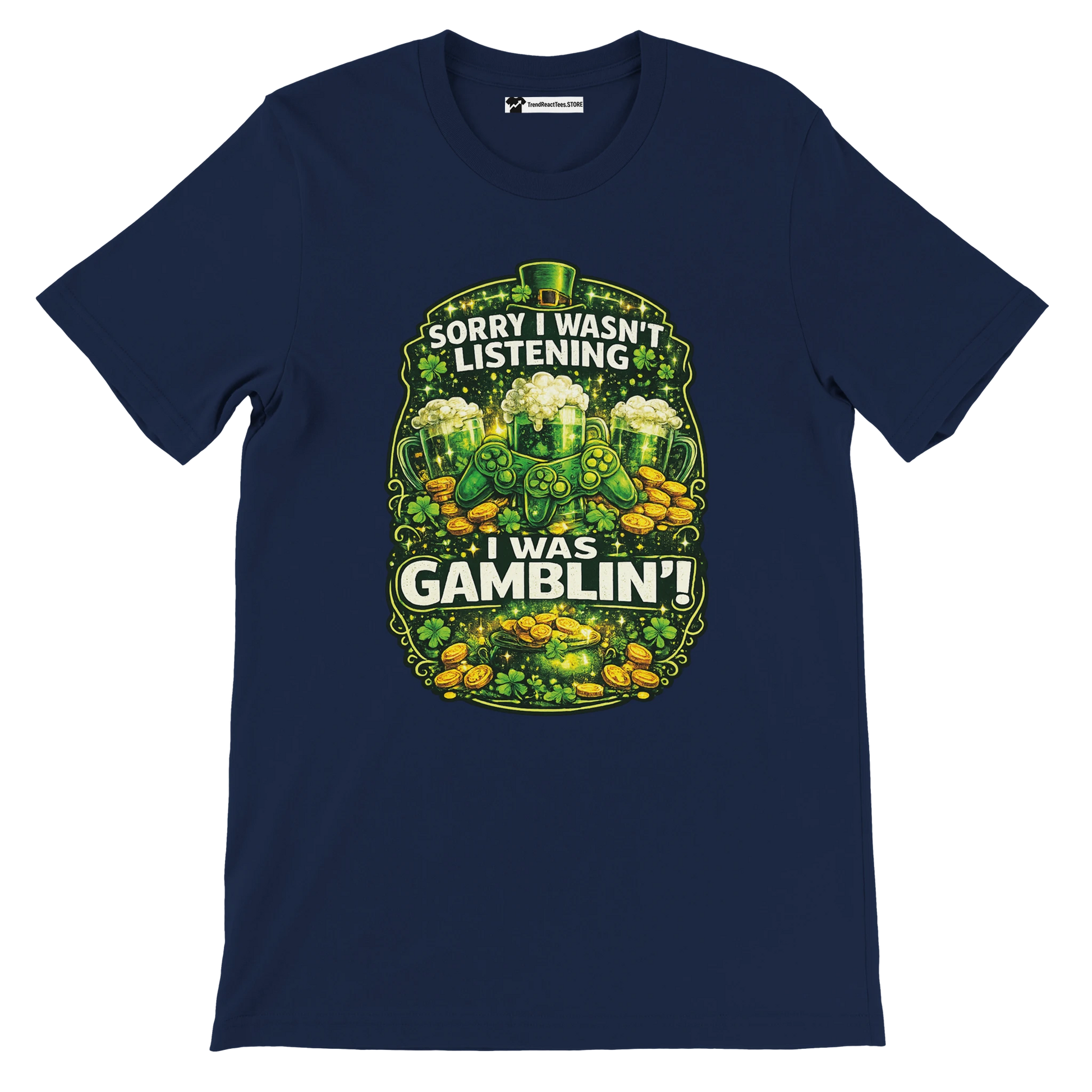 Navy t-shirt with 'Sorry I wasn't listening I was gamblin' text, shamrocks, coins, game controller, and green beer mugs, St. Patrick's Day theme.
