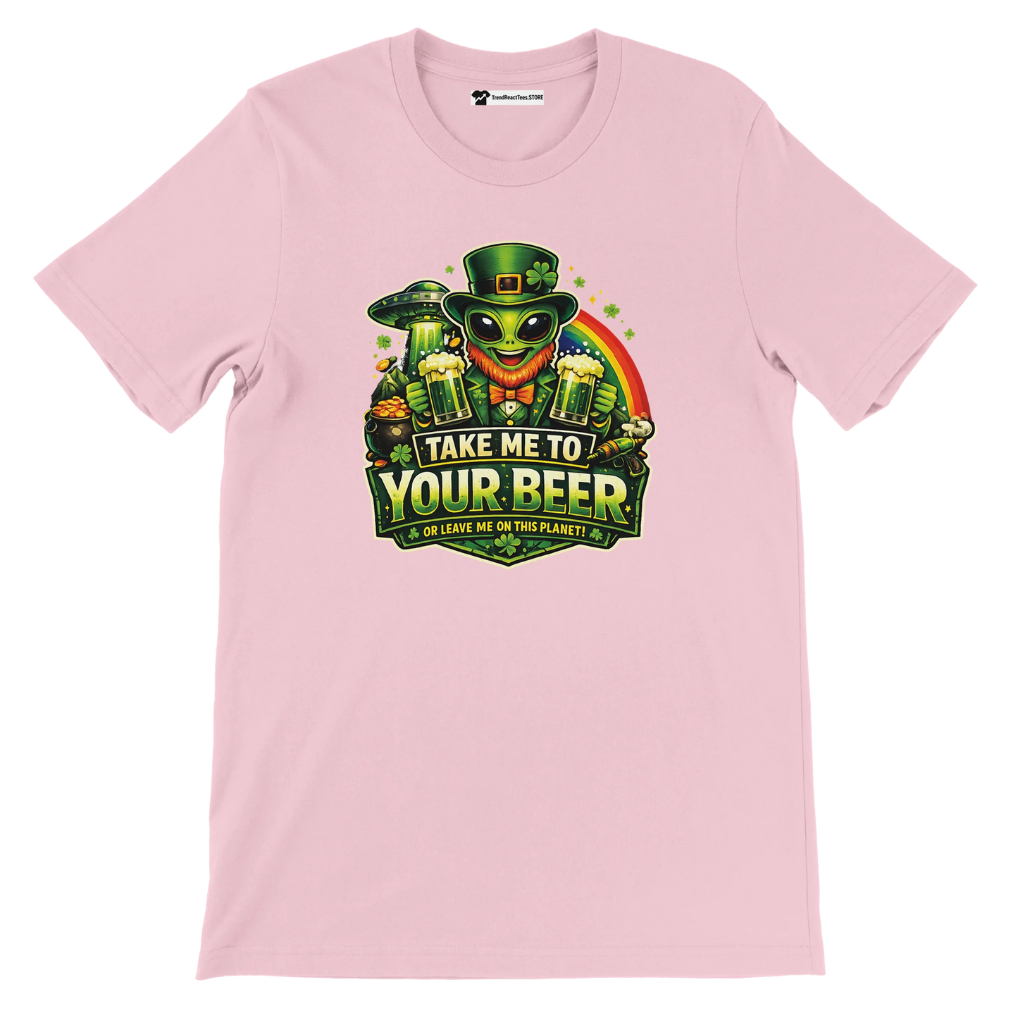 Pink St. Patrick's Day tee with alien leprechaun holding beer, rainbow, shamrocks, and UFO. Funny holiday graphic.