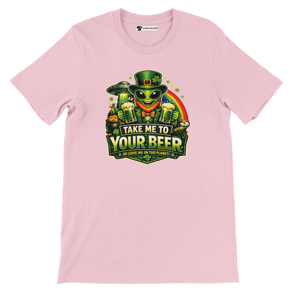 Pink St. Patrick's Day tee with alien leprechaun holding beer, rainbow, shamrocks, and UFO. Funny holiday graphic.