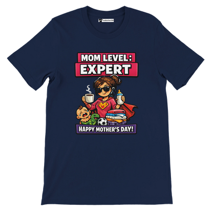 Navy Mother’s Day t-shirt with cartoon supermom, baby, toys, coffee, and text Mom Level: Expert.