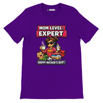 Purple anime-style Mother's Day t-shirt with cartoon supermom, coffee cup, baby, and gifts, text reads 'Mom Level: Expert'.