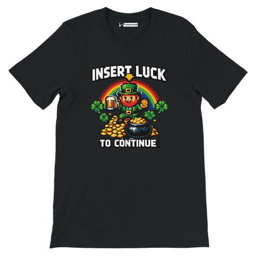 Black t-shirt with pixel art leprechaun, rainbow, gold coins, and 'Insert Luck to Continue' text