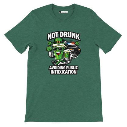 Green tee with cartoon beer mug, police car, shamrocks, and text Not Drunk Avoiding Public Intoxication