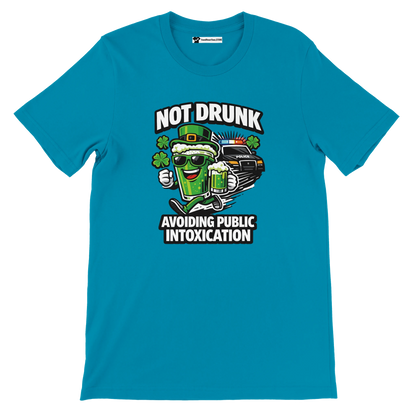 Blue t-shirt with cartoon beer mug, clovers, police car, and St. Patrick's Day quote graphic.