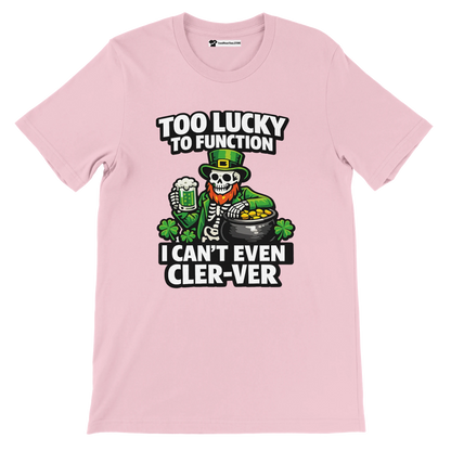 Pink St. Patrick’s Day tee with skeleton leprechaun, beer, gold pot, shamrocks, and funny text 'Too Lucky to Function'