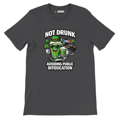 Funny St. Patrick's Day t-shirt with green beer cartoon, clovers, police car, and witty quote