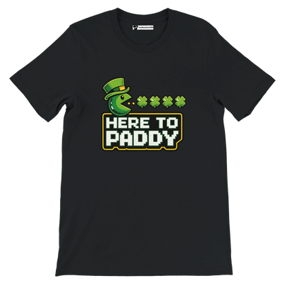 Black St. Patrick's Day tee with Pac-Man eating shamrocks, 'Here to Paddy' text, green leprechaun hat graphic