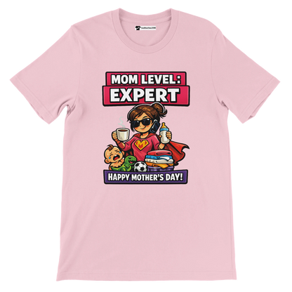 Pink tee with cartoon mom multitasking, text reads 'Mom Level: Expert, Happy Mother's Day'.
