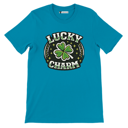 Blue graphic tee with a green shamrock and 'Lucky Charm' text, holiday aesthetic design