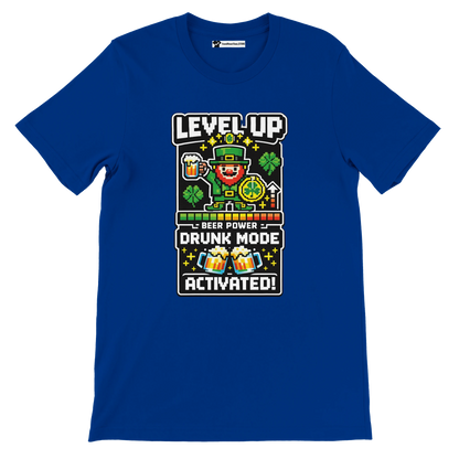 Blue St. Patrick's Day tee with pixel leprechaun, beer, shamrocks, 'Level Up Drunk Mode Activated' graphic