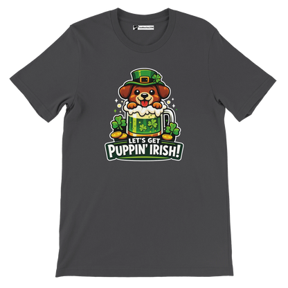 Dark grey t-shirt with cartoon puppy in leprechaun hat, shamrocks, and 'Let's Get Puppin' Irish!' text for St. Patrick's Day