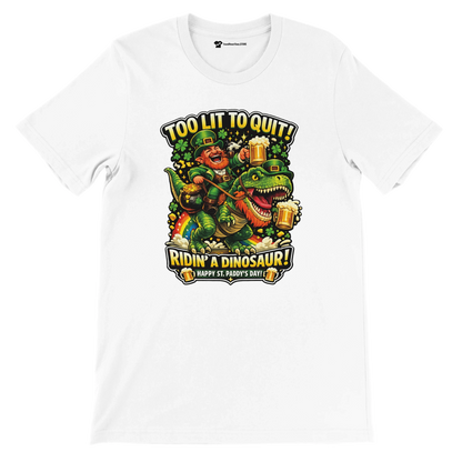 Funny St. Patrick's Day tee: leprechaun riding dinosaur with beer, 'Too Lit to Quit' graphic