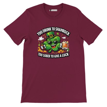 Maroon t-shirt with cartoon shamrock, beer mug, gold coins, and St. Patrick's Day quote