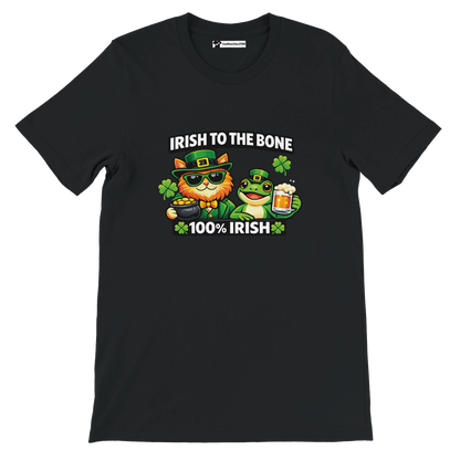 Black St. Patrick's Day tee with cat and frog in green hats, 'Irish to the Bone' text, shamrocks, and beer graphic