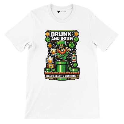 White t-shirt with pixel art leprechaun, beer, shamrocks, and 'Drunk and Irish' text for St. Patrick's Day.