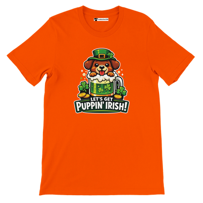 Orange shirt with cartoon dog in leprechaun hat, green beer, shamrocks, and 'Let's Get Puppin' Irish!' text