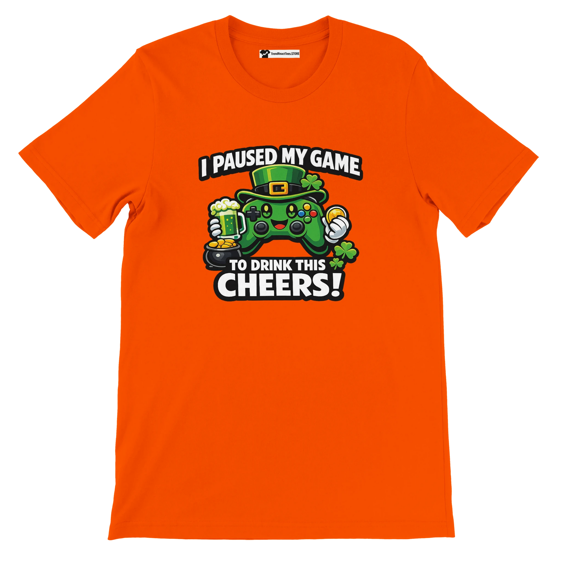 Orange t-shirt with St. Patrick's Day gamer graphic, green controller, text: I paused my game to drink this cheers, clover and beer mug design