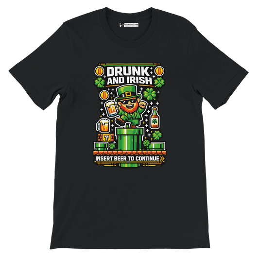 Black tee with pixel art leprechaun, beer, shamrocks, 'Drunk and Irish' text, St. Patrick's Day gaming theme