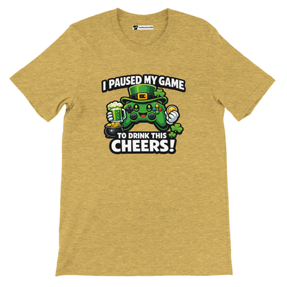 Yellow graphic tee with a green game controller in a leprechaun hat, beer, shamrocks, and text: I Paused My Game To Drink This Cheers