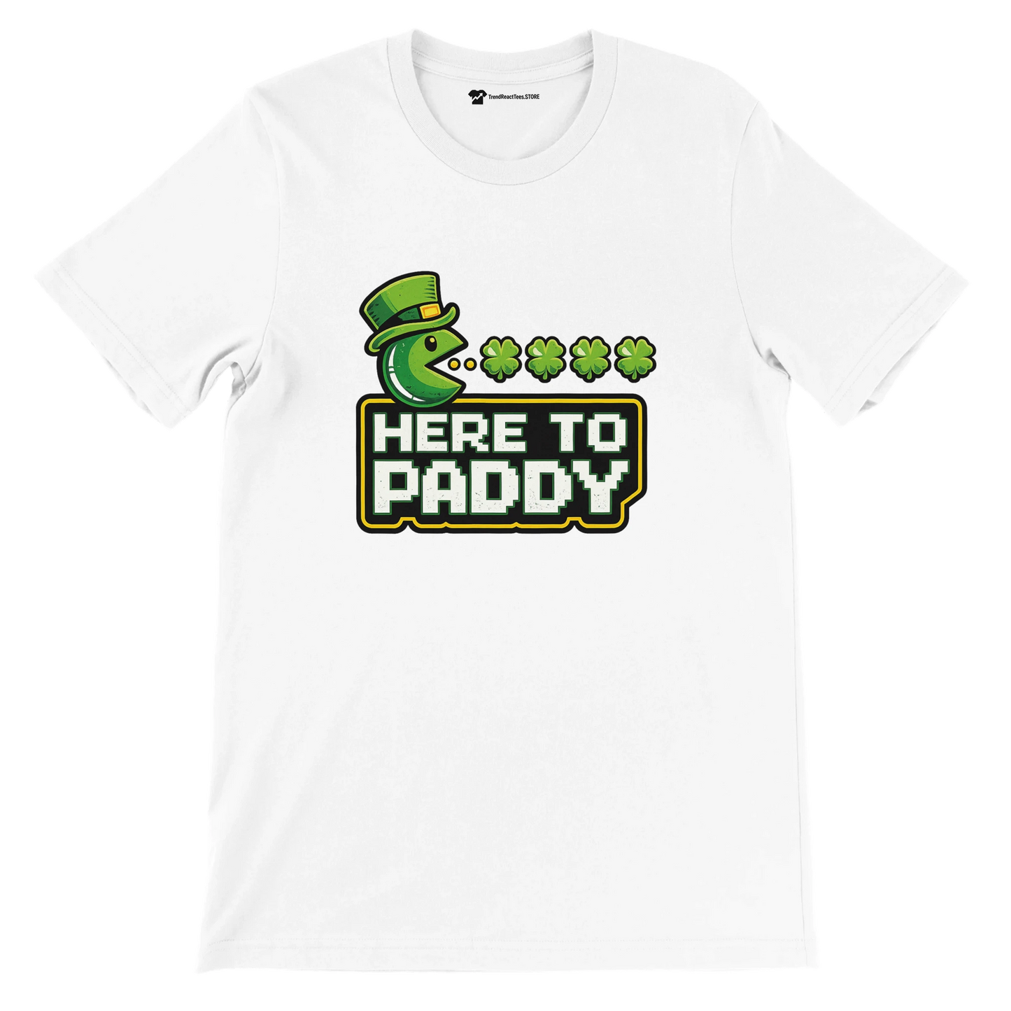 White St. Patrick's Day tee with Pac-Man graphic, green hat, shamrocks, and 'Here to Paddy' text