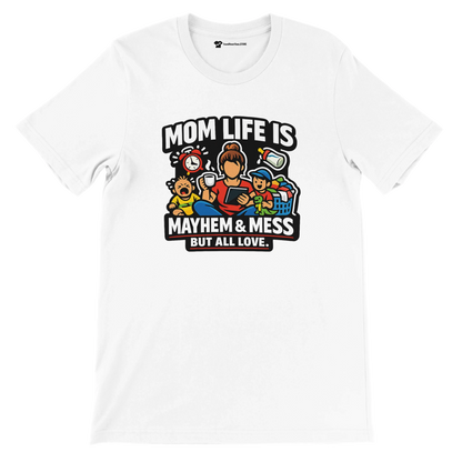 White t-shirt with cartoon mom, kids, laundry, toys and text 'Mom life is mayhem & mess but all love'.