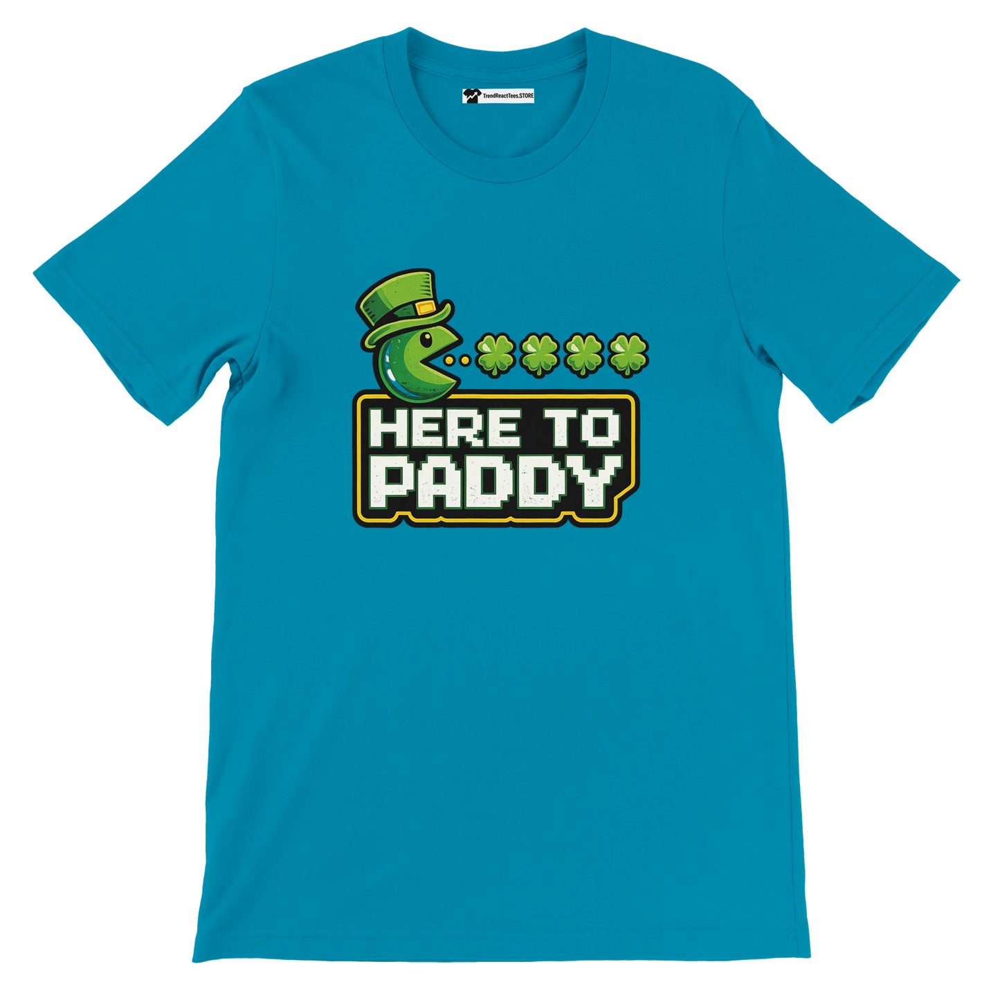 Blue St. Patrick's Day tee with Pac-Man eating shamrocks, 'Here to Paddy' text, leprechaun hat design