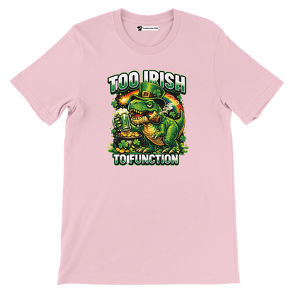 Pink t-shirt with funny dinosaur wearing leprechaun hat, holding beer, text 'Too Irish To Function', St. Patrick's Day design
